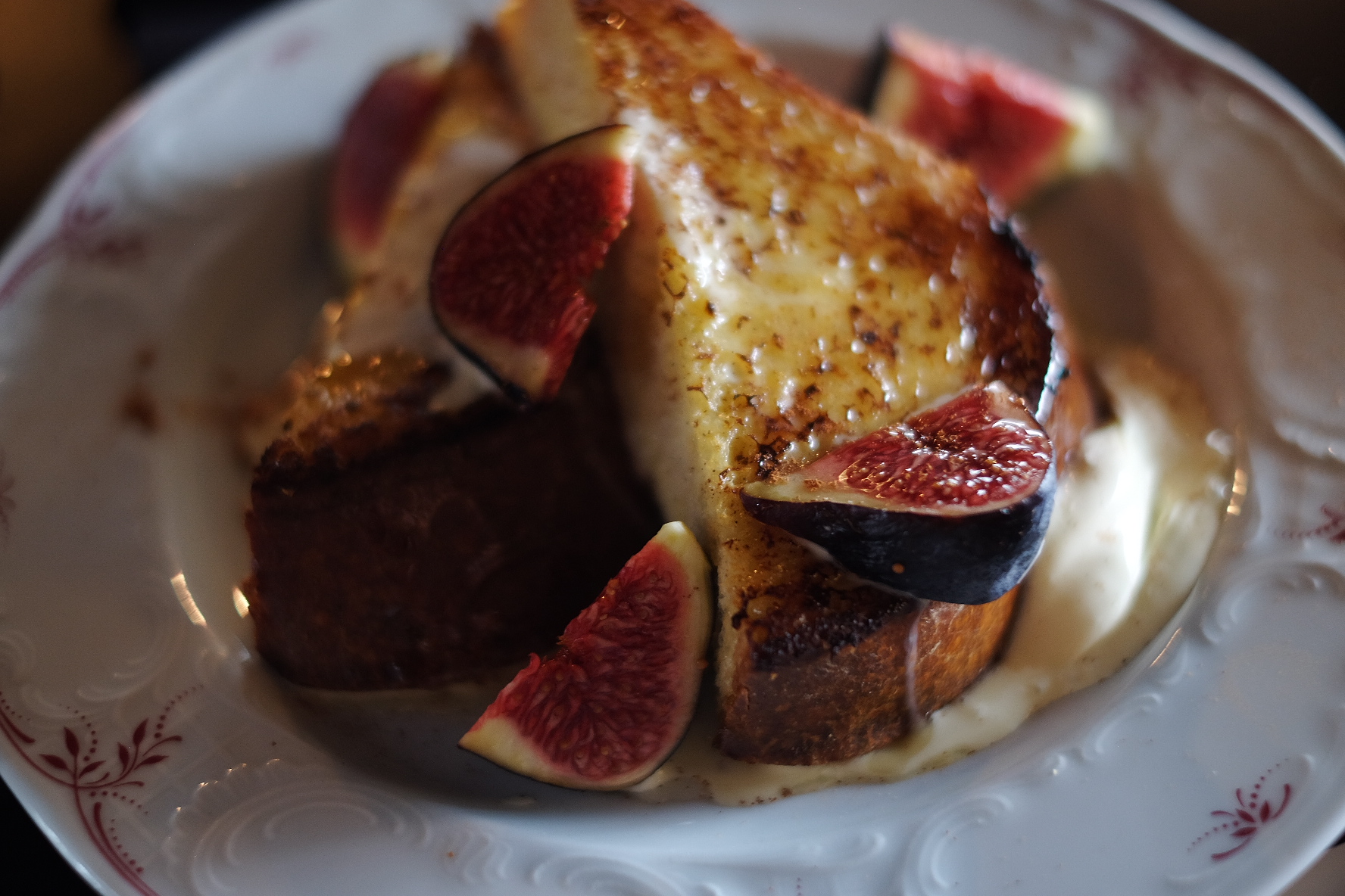 soft, pillowy french toast with maple syrup, figs, and whipped mascarpone cheese at café lomi in Paris' 18th arrondissement 