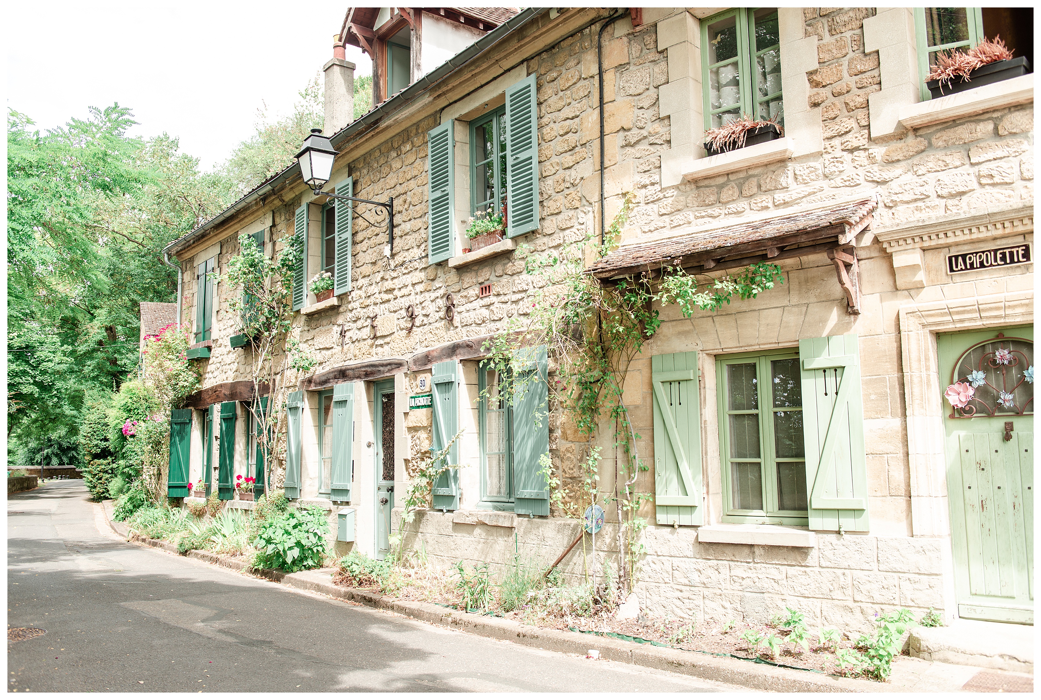 a row of homes in the village of auvers-sur-oise outside of paris