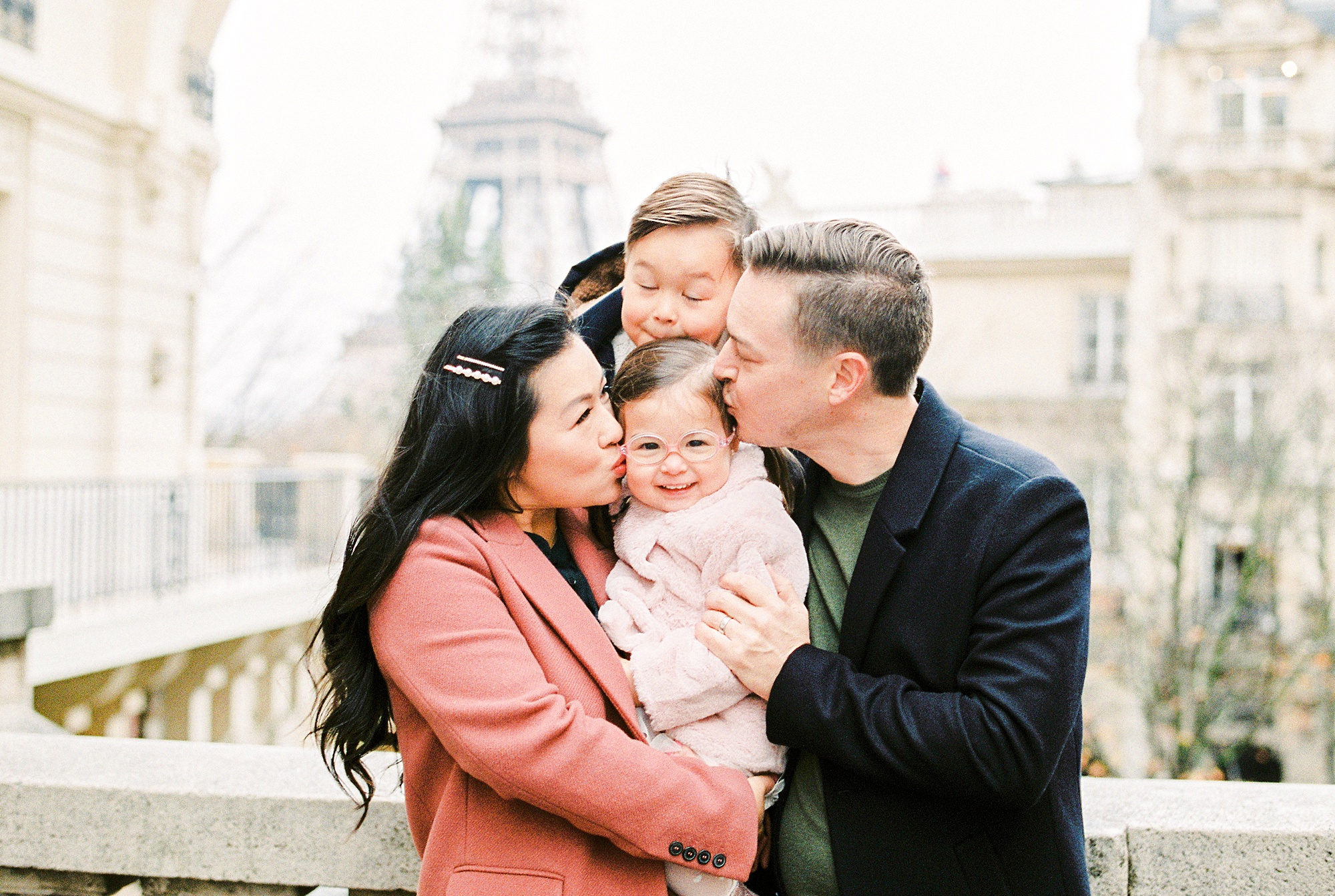 A family portrait session at the Eiffel Tower