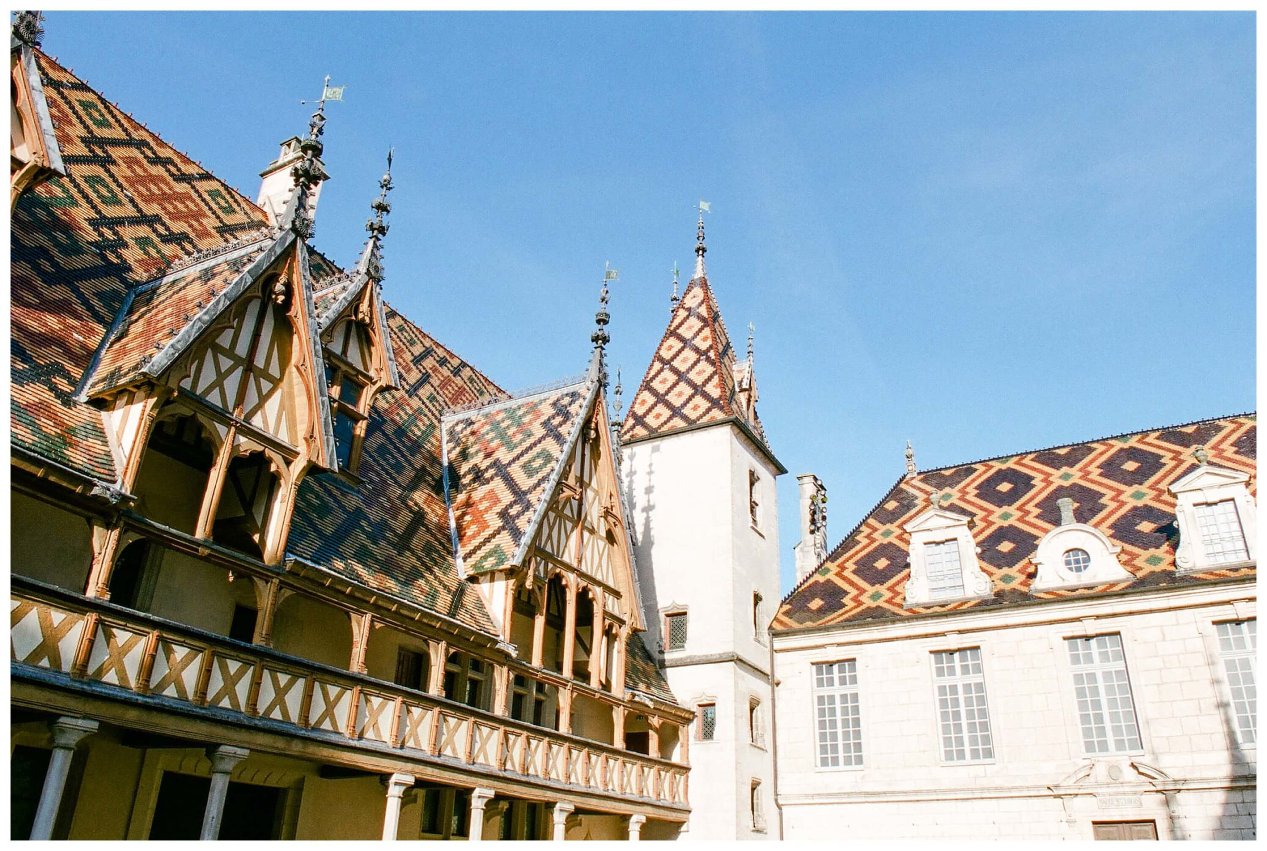 the famous tiled roofs of les hospices de beaune, france