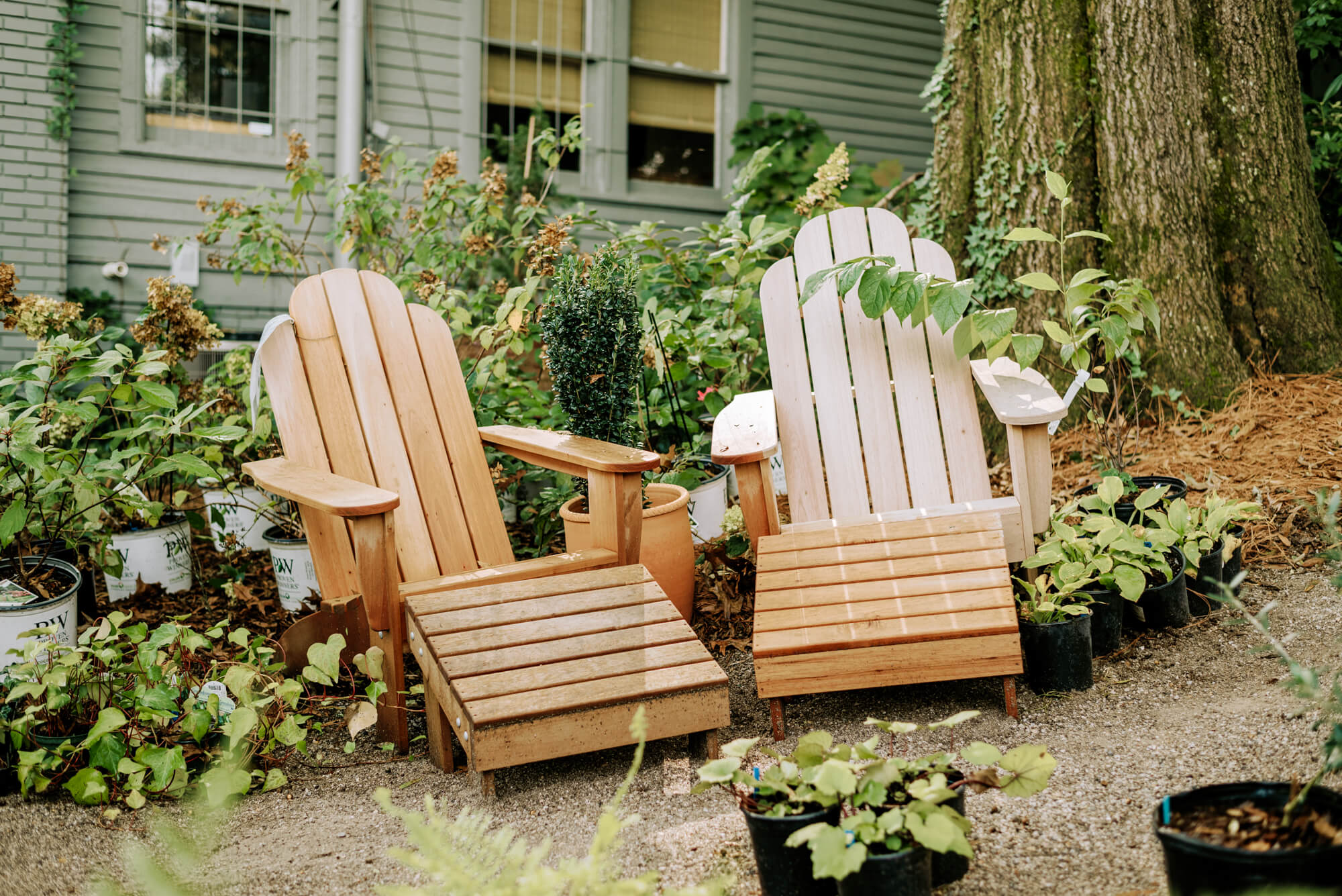 two Adirondack chairs in the garden of Shoppe Birmingham 